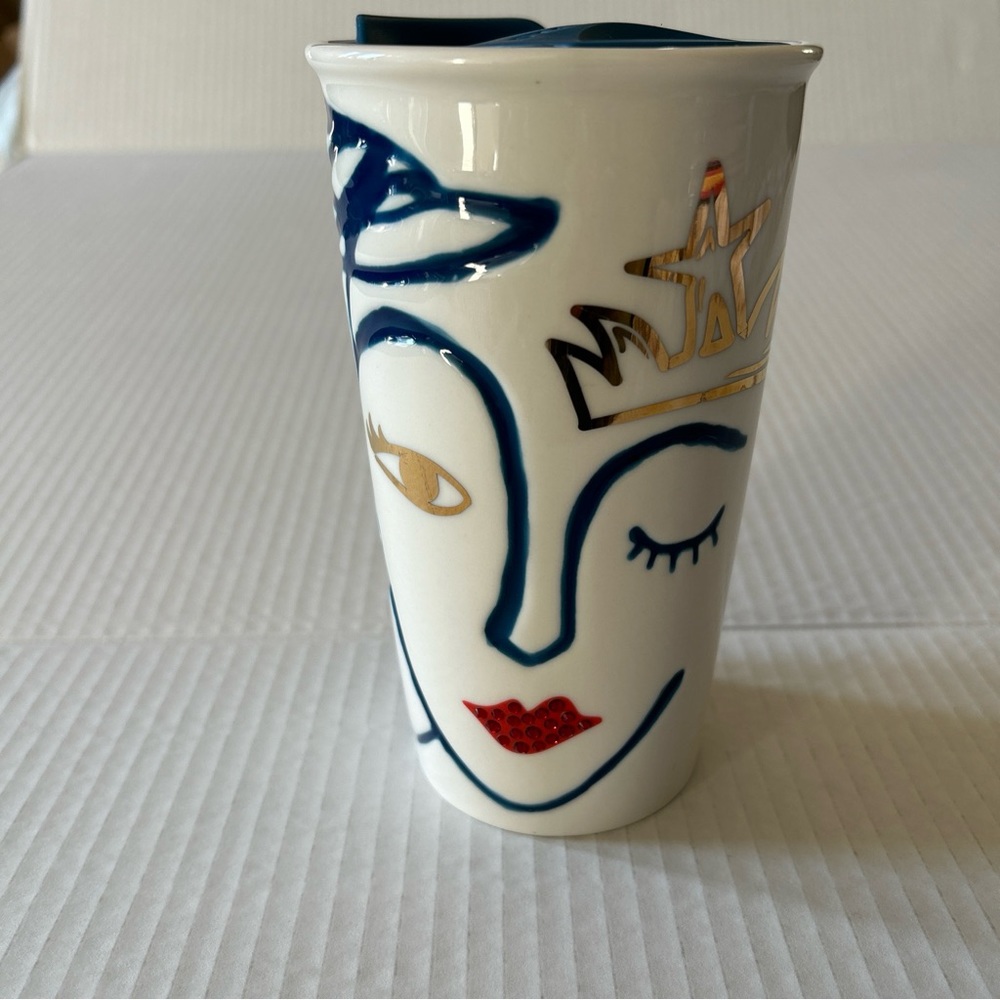 Starbucks travel mug. Ceramic with winking mermaid.